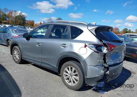 2015 Mazda Cx-5 Touring z USA, uszkodzony, nr VIN JM3KE2CY7F0528142